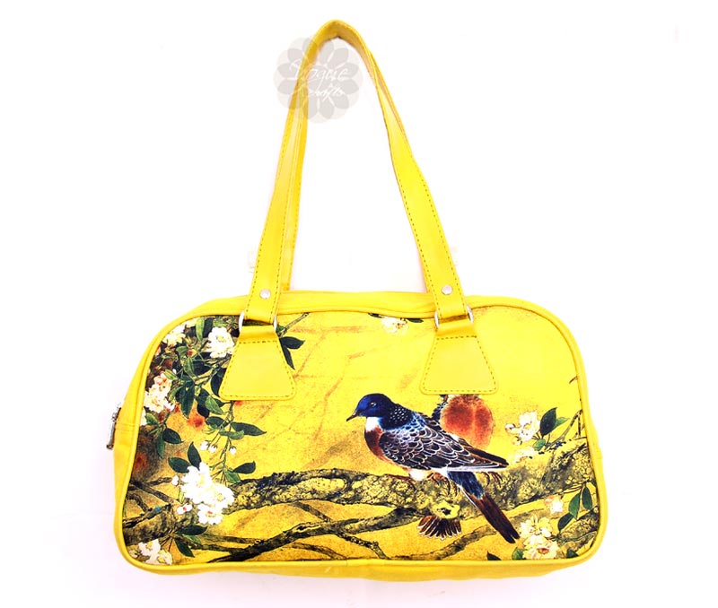 Vogue Crafts & Designs Pvt. Ltd. manufactures Bird Print Yellow Handbag at wholesale price.